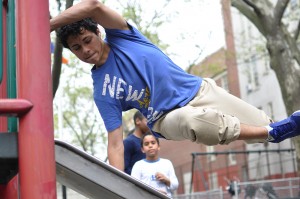 A student performs a parkour movement. (Photo by Andres David Lopez)