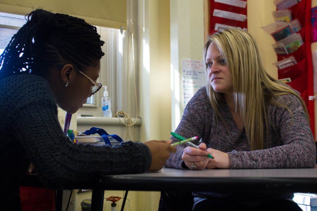 Teacher Katie Luft (right), works with a student in Class 402. (CREDIT: Jamie Martines, March 23, 2016)