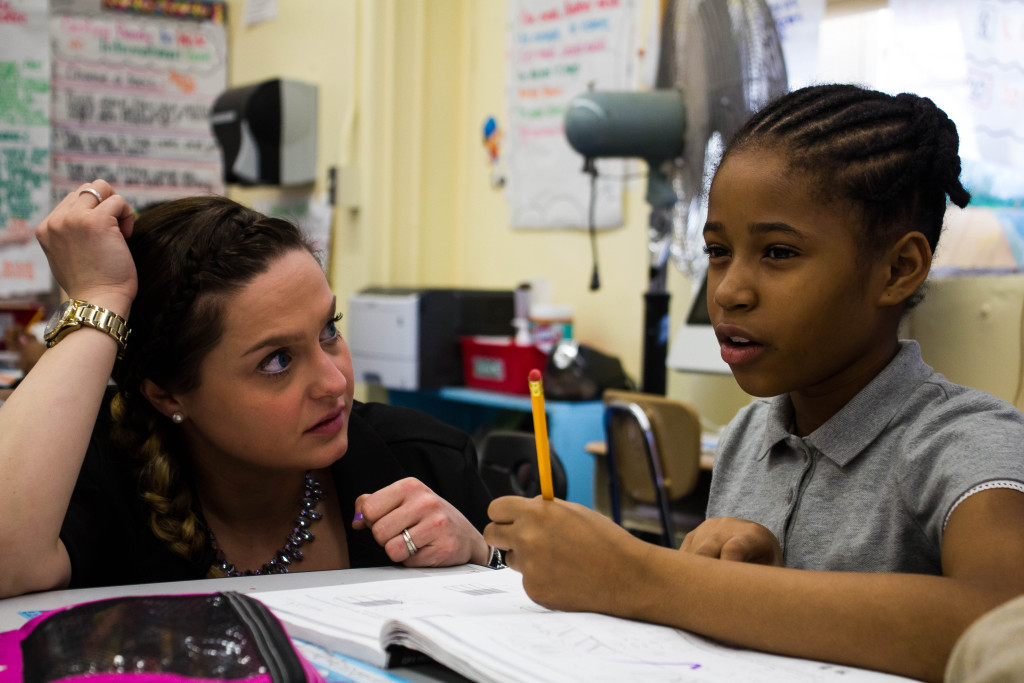 Teacher Melissa Biase (left) works with a student in Class 402. (CREDIT: Jamie Martines, March 23, 2016)