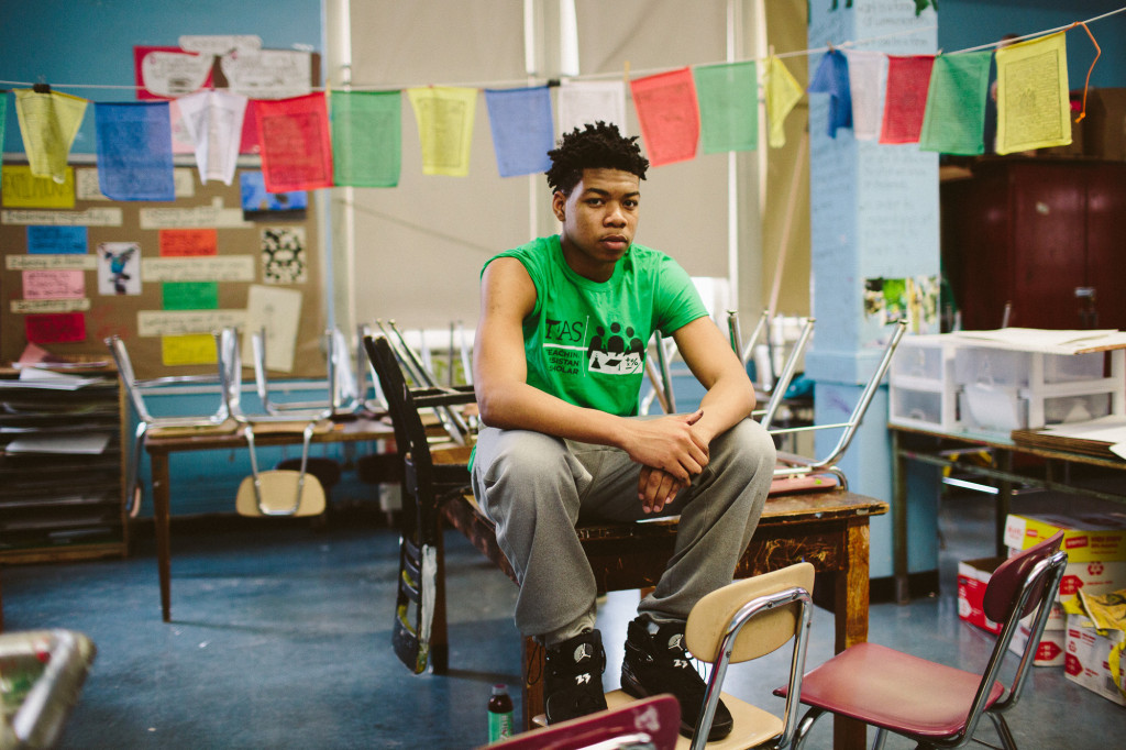 Jamal St. Rose, 16, a junior at Collegiate takes a break from painting inside the art room on a recent Sunday afternoon in February. (CREDIT: Cassandra Giraldo)